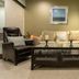 The Mosey Buffalo Williamsville lounge with sofas, leather chairs and coffee table in Williamsville