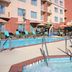 Residence Inn by Marriott Dallas Plano/The Colony outdoor pool with hot tub and lounge chairs