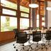 Hohenwart Forum in Pforzheim meeting room with conference table, chairs, large windows and wall display
