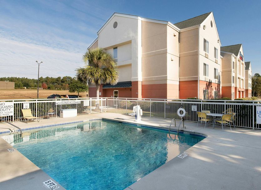 Fairfield Inn by Marriott Orangeburg outdoor pool with lounge chairs and hotel exterior
