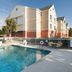 Fairfield Inn by Marriott Orangeburg outdoor pool with lounge chairs and hotel exterior