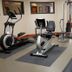 Wingate by Wyndham Coon Rapids fitness room with treadmill, stationary bike and elliptical machines