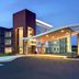 Fairfield Inn & Suites by Marriott Madison West/Middleton in Middleton with illuminated covered entrance at dusk