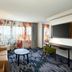 Fairfield Inn & Suites by Marriott Denver Southwest/Lakewood in Lakewood guest room with sofa, desk, and TV