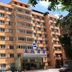 Nan Xiang Hotel - Guiyang high-rise exterior with balconies and main entrance in Guiyang