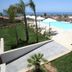 I Giardini della Castellana in Marina di Ragusa with outdoor pool, sun loungers, and sea view