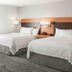 TownePlace Suites by Marriott Bangor guest room with two beds and window light