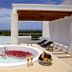 Bahia Principe Escape Sian Ka'an in Akumal: rooftop hot tub with rose petals, drinks and ocean view
