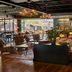 High Country Motor Lodge in Flagstaff lounge with bar, leather seating, and warm pendant lighting