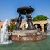 Fiesta Inn Morelia Altozano fountain sculpture with water jets and clear blue sky in Morelia
