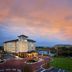 Hotel Indigo Jacksonville-Deerwood Park By IHG in Jacksonville with lakefront patio at sunset