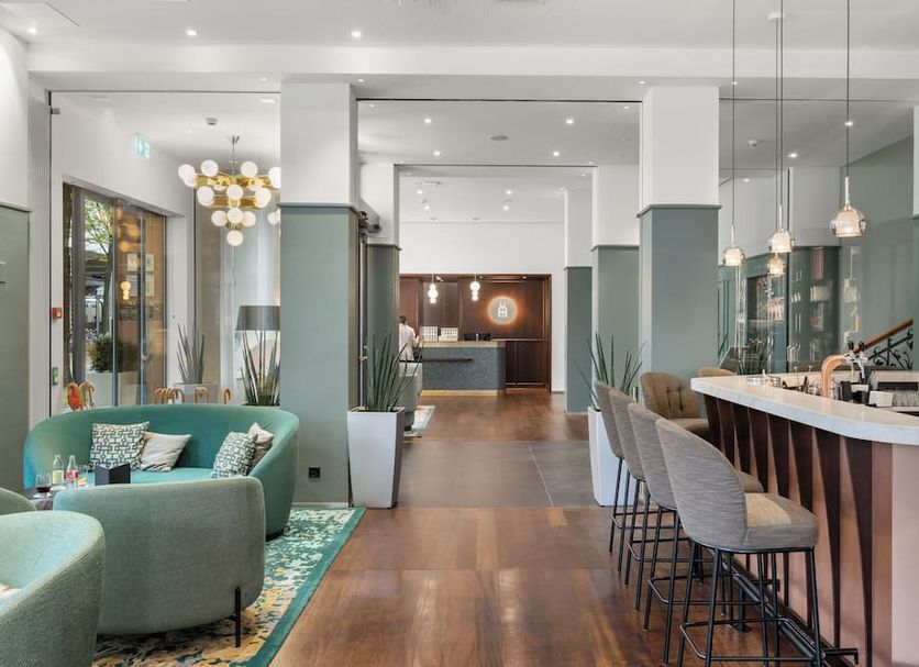 Waldstatterhof Swiss Quality Hotel in Lucerne lobby lounge with bar seating and modern décor
