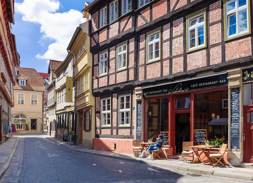Regiohotel Quedlinburger Hof Quedlinburg exterior on a narrow cobblestone street in Quedlinburg