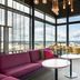 Solo Sokos Hotel Torni Tampere rooftop lounge with floor-to-ceiling windows and city views in Tampere