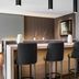 AC Hotels by Marriott Bologna lobby bar with high stools and modern lighting