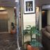 Ahla Tala Hotel in Aqaba lobby with elevator doors, potted plants and seating area