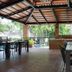La Joya Del Lago in Ajijic outdoor covered dining terrace with tables and brick columns