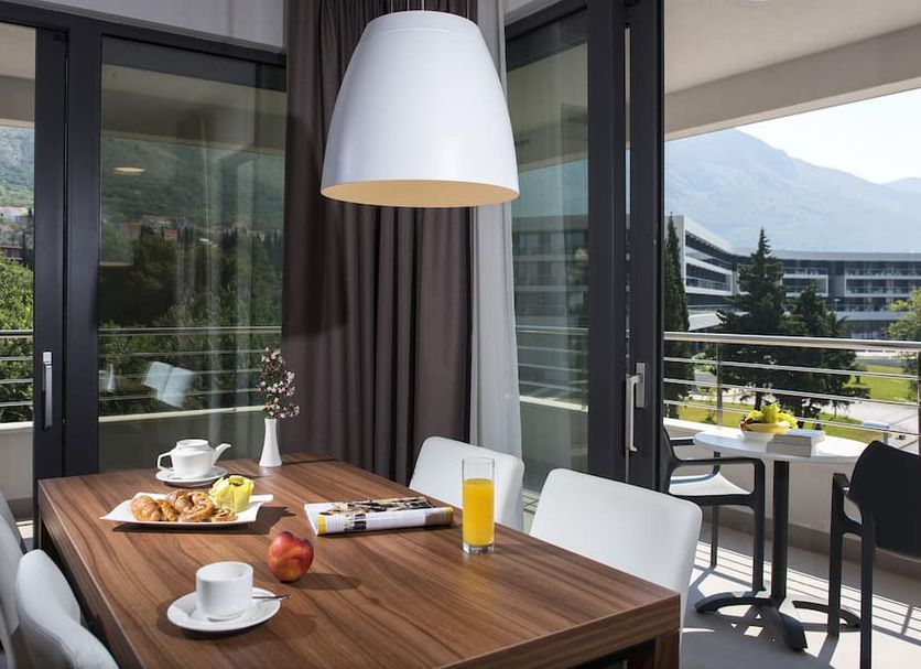 Maistra Select Srebreno Premium Apartments in Mlini with balcony dining table and mountain views