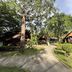 Seashell Resort Hostel Koh Tao in Ko Tao, tropical garden paths and bungalow-style cabins