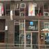 Hotel La Ronda in Castro-Urdiales exterior with flags and glass entrance