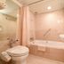 Gunma Royal Hotel in Maebashi bathroom with bathtub, shower, toilet and sink