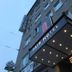 Fair Hotel Europaallee in Frankfurt am Main, exterior entrance with illuminated canopy and signage