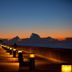 Wyndham Deerfield Beach Resort pier at sunset with glowing walkway lights over the ocean
