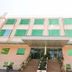 Hotel The Great Ananda in Haridwar, exterior with front steps, entrance canopy and green-tinted windows