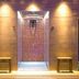 Ilsington Country House Hotel & Spa in Newton Abbot spa entrance with lit mosaic shower alcove