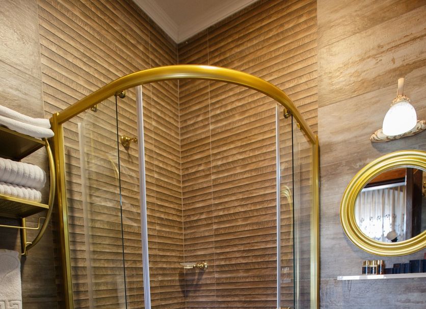 Tahir Aga Konagi Hotel Trabzon bathroom with glass shower, toilet and pedestal sink