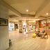 Sinclairs Bayview in Port Blair lobby with lounge seating, ceiling fans and warm ambient lighting