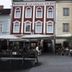 Hotel Vinothek Schwarzer Adler in Ottensheim with outdoor café seating in front of a historic facade