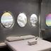 Astrotel Cubao in Quezon City, space-themed room with oval windows and a bed beside a chair
