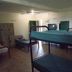K - Town Hotel, Katherine: basic dorm room with bunk beds, lockers, ceiling fan and TV