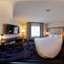 Fairfield by Marriott Inn & Suites Milwaukee Brookfield guest room with king bed, TV and window view in Brookfield