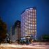 Shilla Stay Ulsan high-rise hotel at night on a city street in Ulsan