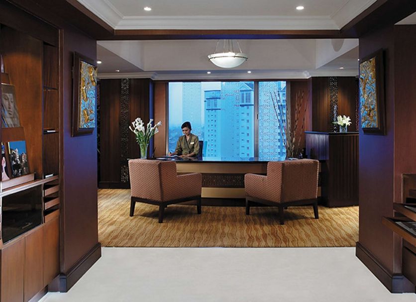 Shangri-la Surabaya lounge with seating and city skyline views in Surabaya
