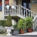 Hotel il Focolare in Fabro exterior with staircase, potted plants, and entrance signage