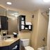 Hampton Inn Harrisburg/Grantville/Hershey bathroom with vanity, toilet, tub-shower, and towel shelf in Grantville