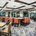 Homewood Suites by Hilton Henderson South Las Vegas lobby lounge with seating and dining tables in Henderson