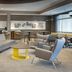 SpringHill Suites by Marriott Orange Beach at The Wharf lobby seating area with lounge chairs and tables