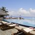 Anantara Veli Maldives Resort in Veligandu Huraa, oceanfront infinity pool with loungers and sea view
