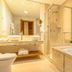 Hotel Le Renard in Campos do Jordão bathroom with double sinks, glass shower and soaking tub