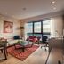 Fraser Place Antasya Istanbul apartment with city view, dining table, sofa and desk in Istanbul