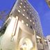 Alley Hotel Hiroshima Namikidori exterior in Hiroshima with a lit arched entrance at dusk