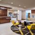 Homewood Suites by Hilton Aliso Viejo - Laguna Beach lobby with seating area and front desk