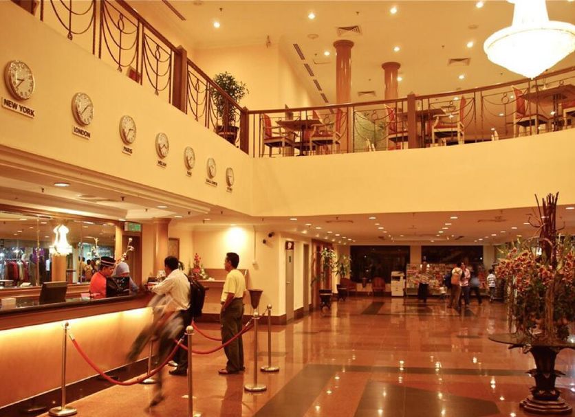 Kuala Lumpur International Hotel lobby in Kuala Lumpur with mezzanine dining and polished floors