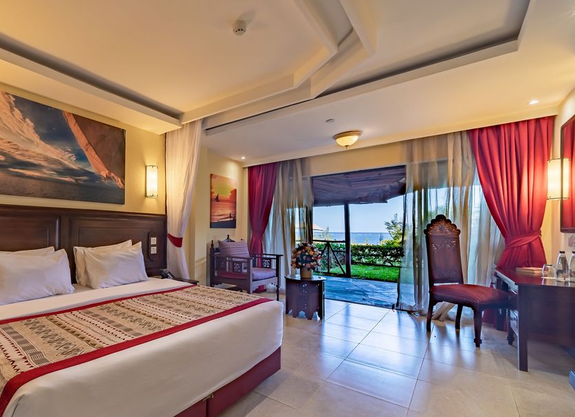 Prideinn Paradise Beach Resort & Spa Mombasa room with balcony ocean view and king bed