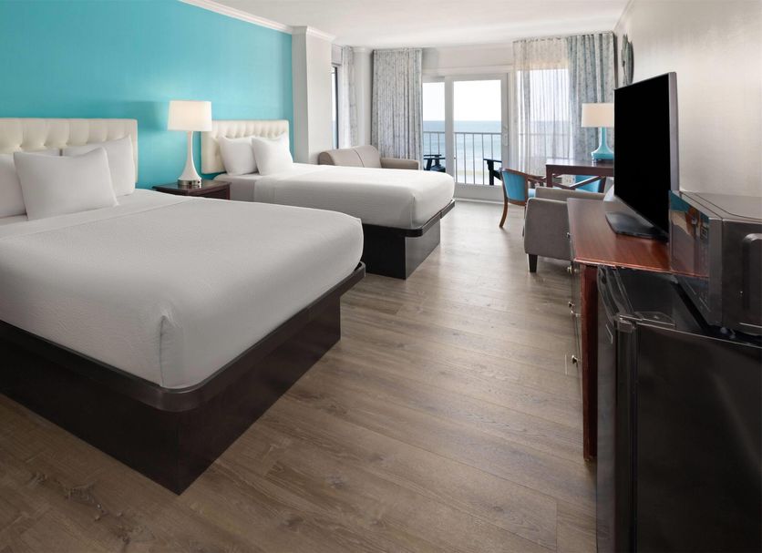 Howard Johnson Plaza by Wyndham Ocean City Oceanfront guest room with two beds and balcony view