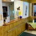 Hotel Restaurant Schwarzes Ross in Oberwiesenthal reception desk with wood paneling and service window